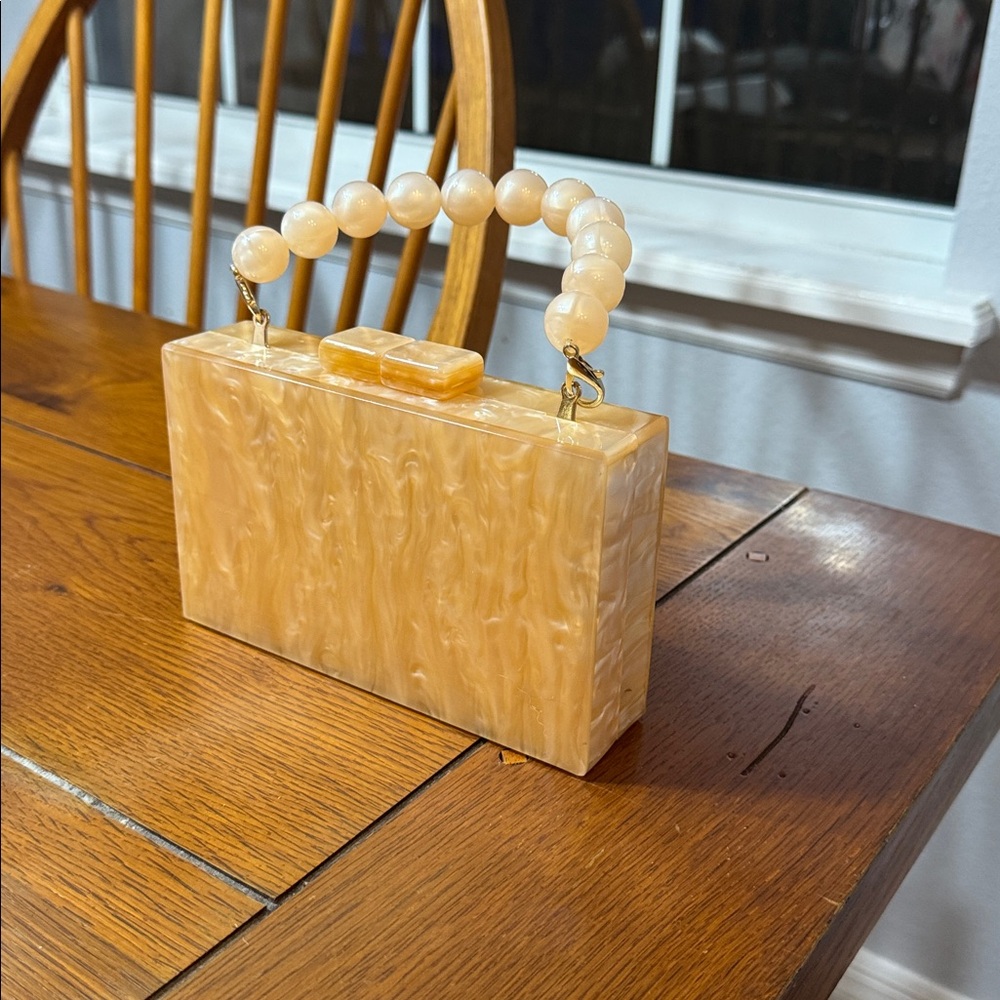 Chic Cream Clutch with Beaded Handle